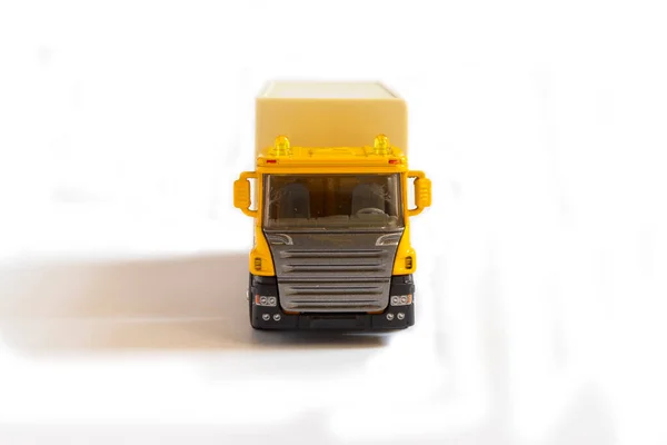 A yellow semi truck with a white trailer attached. Isolated on a white background. Clipping path included — Stock Photo, Image