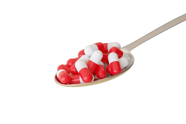 Close up of a spoon full of pills isolated on a white background. Self-medication concept. 3d illustration.