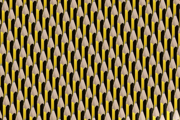 Yellow and black graphite Pencils Pattern background. 3d illustration.