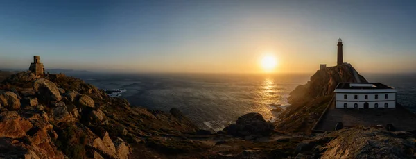 Lighthouse at sunset, nature landscape