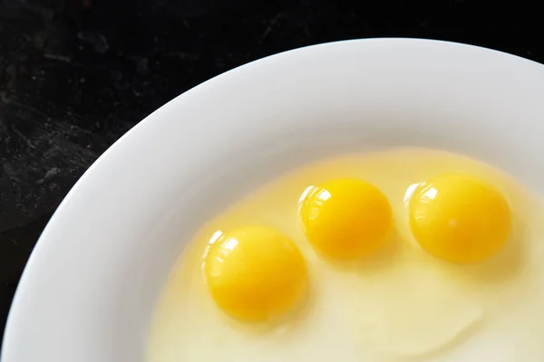 Close Three Broken Quail Eggs Shalow White Plate Black Rusty — Stock Photo, Image