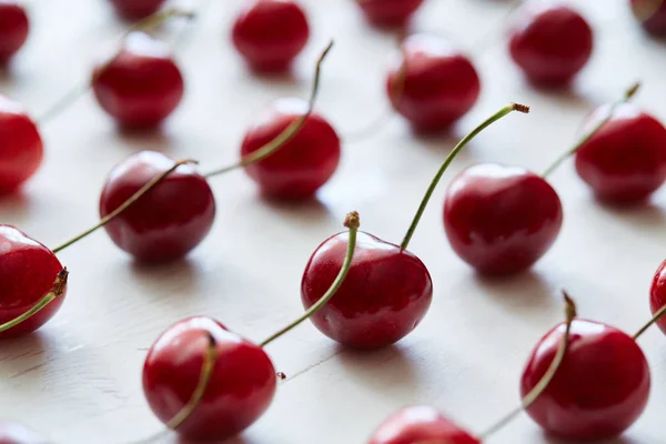 Scattered Sweet Cherries White Vintage Background Copy Space Texture Background — Stock Photo, Image