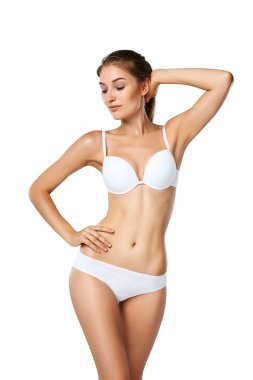 Stüdyo Hd yakalama güzel genç bir kadın iç çamaşırı. Mükemmel ince bronzlaşmış vücudu - spor, diyet, fitness veya plastik cerrahi ve estetik kozmetik örneği