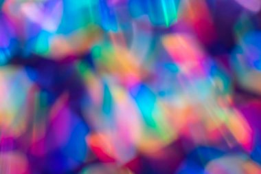 Gökkuşağı mavisi ışıltılı arka plan ve Bokeh ışıkları. Yeni yıl, Noel tatilleri ve yıldönümleri için kutlama konsepti.