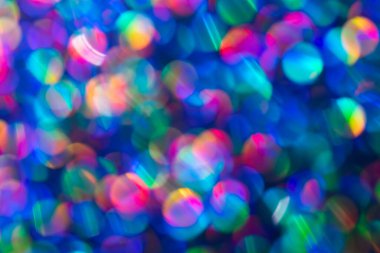 Gökkuşağı mavisi ışıltılı arka plan ve Bokeh ışıkları. Yeni yıl, Noel tatilleri ve yıldönümleri için kutlama konsepti.