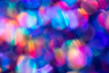 Gökkuşağı mavisi ışıltılı arka plan ve Bokeh ışıkları. Yeni yıl, Noel tatilleri ve yıldönümleri için kutlama konsepti.