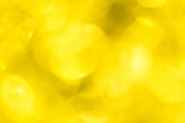 Bokeh ışıkları olan altın parıltılı şenlik arka planı. Yeni yıl, Noel tatili ve Sevgililer Günü için kutlama konsepti.