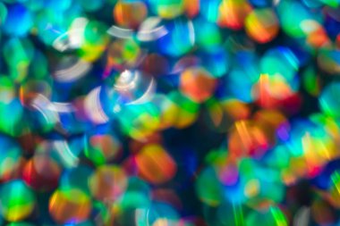 Gökkuşağı mavisi ışıltılı arka plan ve Bokeh ışıkları. Yeni yıl, Noel tatilleri ve yıldönümleri için kutlama konsepti.