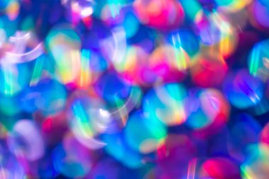 Gökkuşağı mavisi ışıltılı arka plan ve Bokeh ışıkları. Yeni yıl, Noel tatilleri ve yıldönümleri için kutlama konsepti.