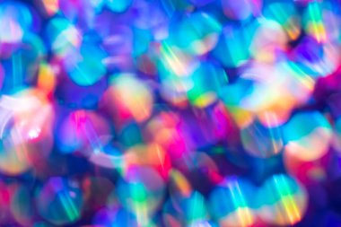 Gökkuşağı mavisi ışıltılı arka plan ve Bokeh ışıkları. Yeni yıl, Noel tatilleri ve yıldönümleri için kutlama konsepti.