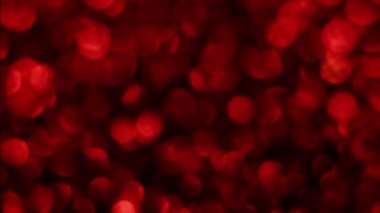 Kırmızı Mutlu Noeller sihirli Bokeh arka planı aydınlatıyor. Cazibeli Sevgililer Günü duvar kâğıdı. Yılbaşı, yıldönümü kutlamaları ve düğün törenleri için gösterişli full HD video..