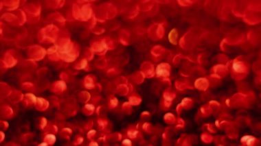 Kırmızı Mutlu Noeller sihirli Bokeh arka planı aydınlatıyor. Cazibeli Sevgililer Günü duvar kâğıdı. Yılbaşı, yıldönümü kutlamaları ve düğün törenleri için gösterişli full HD video..