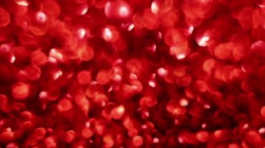 Kırmızı Mutlu Noeller sihirli Bokeh arka planı aydınlatıyor. Cazibeli Sevgililer Günü duvar kâğıdı. Yılbaşı, yıldönümü kutlamaları ve düğün törenleri için gösterişli full HD video..