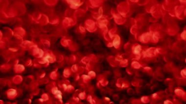 Kırmızı Mutlu Noeller sihirli Bokeh arka planı aydınlatıyor. Cazibeli Sevgililer Günü duvar kâğıdı. Yılbaşı, yıldönümü kutlamaları ve düğün törenleri için gösterişli full HD video..