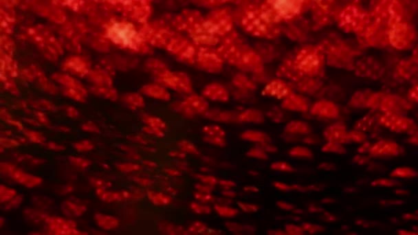 Rouge Joyeux Noël magique bokeh lumières fond. Glamour joyeux papier de valentines jour. Luxe brillant Full HD vidéo pour le Nouvel An, Célébration unniversaire et de la cérémonie de mariage.