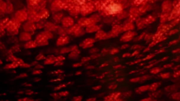 Rouge Joyeux Noël magique bokeh lumières fond. Glamour joyeux papier de valentines jour. Luxe brillant Full HD vidéo pour le Nouvel An, Célébration unniversaire et de la cérémonie de mariage.