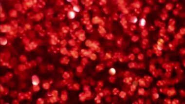 Kırmızı Mutlu Noeller sihirli Bokeh arka planı aydınlatıyor. Cazibeli Sevgililer Günü duvar kâğıdı. Yılbaşı, yıldönümü kutlamaları ve düğün törenleri için gösterişli full HD video..