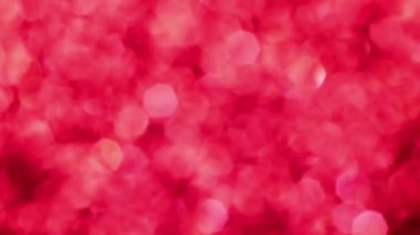 Kırmızı Mutlu Noeller sihirli Bokeh arka planı aydınlatıyor. Cazibeli Sevgililer Günü duvar kâğıdı. Yılbaşı, yıldönümü kutlamaları ve düğün törenleri için gösterişli full HD video..