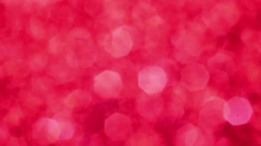 Kırmızı Mutlu Noeller sihirli Bokeh arka planı aydınlatıyor. Cazibeli Sevgililer Günü duvar kâğıdı. Yılbaşı, yıldönümü kutlamaları ve düğün törenleri için gösterişli full HD video..