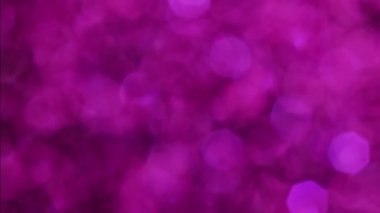 Violet Mutlu Noeller sihirli gece lambaları arka planı. Göz kamaştırıcı bir duvar kağıdı. Yılbaşı, yıldönümü kutlamaları ve düğün törenleri için gösterişli full HD video..