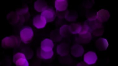 Violet Mutlu Noeller sihirli gece lambaları arka planı. Göz kamaştırıcı bir duvar kağıdı. Yılbaşı, yıldönümü kutlamaları ve düğün törenleri için gösterişli full HD video..