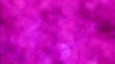 Violet Mutlu Noeller sihirli gece lambaları arka planı. Göz kamaştırıcı bir duvar kağıdı. Yılbaşı, yıldönümü kutlamaları ve düğün törenleri için gösterişli full HD video..