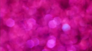 Violet Mutlu Noeller sihirli gece lambaları arka planı. Göz kamaştırıcı bir duvar kağıdı. Yılbaşı, yıldönümü kutlamaları ve düğün törenleri için gösterişli full HD video..