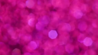 Violet Mutlu Noeller sihirli gece lambaları arka planı. Göz kamaştırıcı bir duvar kağıdı. Yılbaşı, yıldönümü kutlamaları ve düğün törenleri için gösterişli full HD video..
