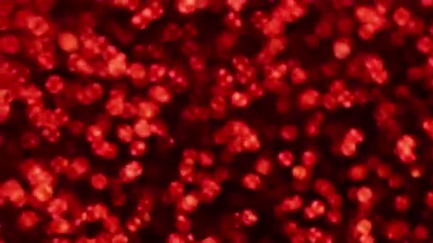 Rouge Joyeux Noël magique bokeh lumières fond. Glamour joyeux papier de valentines jour. Luxe brillant Full HD vidéo pour le Nouvel An, Célébration unniversaire et de la cérémonie de mariage.