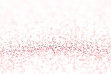 Pembe parıltı dokusu. Şenlikli ışıl ışıl pullar arka planda yakın plan. Sevgililer günü, yeni yıl ve Noel tatilleri için parlak parlak duvar kağıtları..