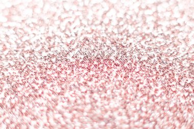 Pembe parıltı dokusu. Şenlikli ışıl ışıl pullar arka planda yakın plan. Sevgililer günü, yeni yıl ve Noel tatilleri için parlak parlak duvar kağıtları..