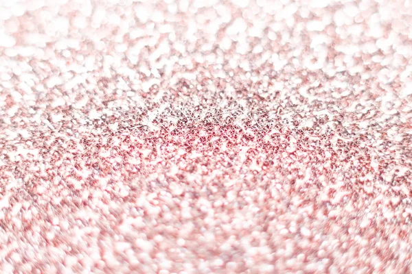 Pembe parıltı dokusu. Şenlikli ışıl ışıl pullar arka planda yakın plan. Sevgililer günü, yeni yıl ve Noel tatilleri için parlak parlak duvar kağıtları..