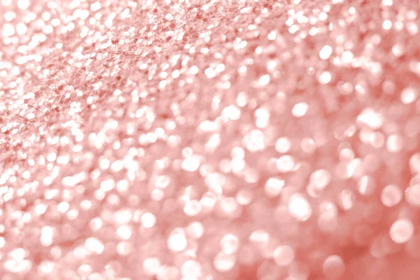 Pembe parıltı dokusu. Şenlikli ışıl ışıl pullar arka planda yakın plan. Sevgililer günü, yeni yıl ve Noel tatilleri için parlak parlak duvar kağıtları..