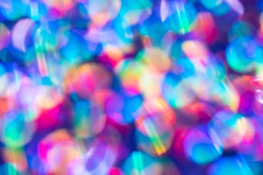 Gökkuşağı mavisi ışıltılı arka plan ve Bokeh ışıkları. Yeni yıl, Noel tatilleri ve yıldönümleri için kutlama konsepti.