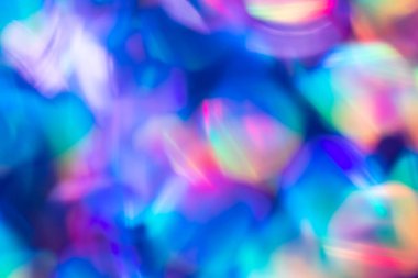 Gökkuşağı mavisi ışıltılı arka plan ve Bokeh ışıkları. Yeni yıl, Noel tatilleri ve yıldönümleri için kutlama konsepti.