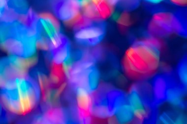 Gökkuşağı mavisi ışıltılı arka plan ve Bokeh ışıkları. Yeni yıl, Noel tatilleri ve yıldönümleri için kutlama konsepti.