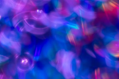 Gökkuşağı mavisi ışıltılı arka plan ve Bokeh ışıkları. Yeni yıl, Noel tatilleri ve yıldönümleri için kutlama konsepti.