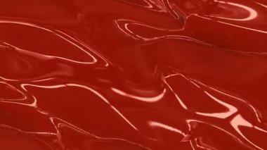 Canlı Kırmızı Sıvı Yüzeyinin Dinamik Akışı ve Dokuları Çekici Hareket ve Yansımaları vurgulayan İki Ayrı Çerçevede Yakalandı