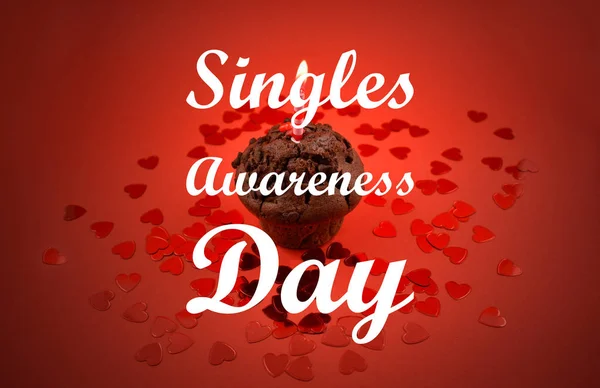 Singles Awareness Day Sweet Chocolate muffin illustration. Muffin with candle. Chocolate muffin with heart on a red background. February 15, Singles Awareness Day. American holiday. Important day