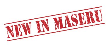 Beyaz arka plan üzerinde izole maseru kırmızı pul yenilikler