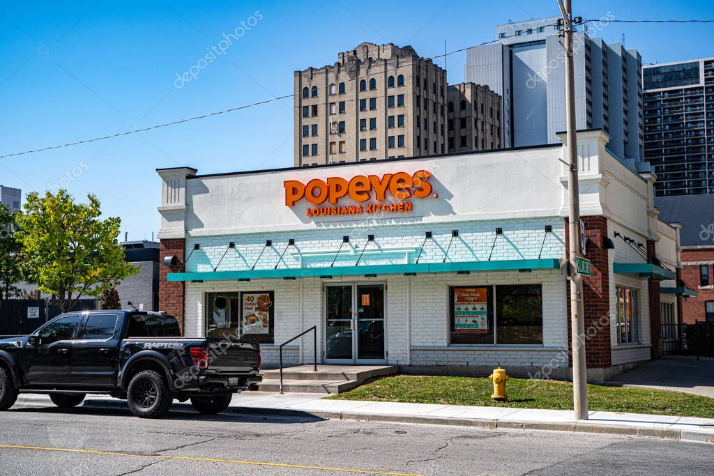 View of Popeyes Louisiana Kitchen restaurant exterior. Windsor, Canada - September 11, 2025