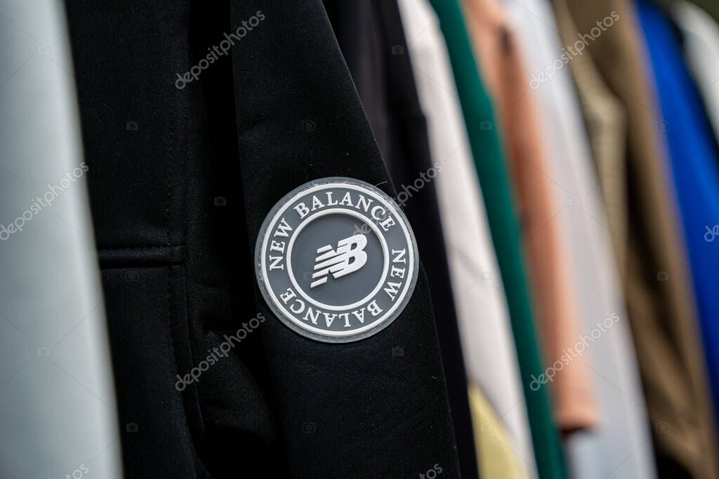 Close up of New Balance logo on black jacket. Toronto, Canada - September 20, 2025.
