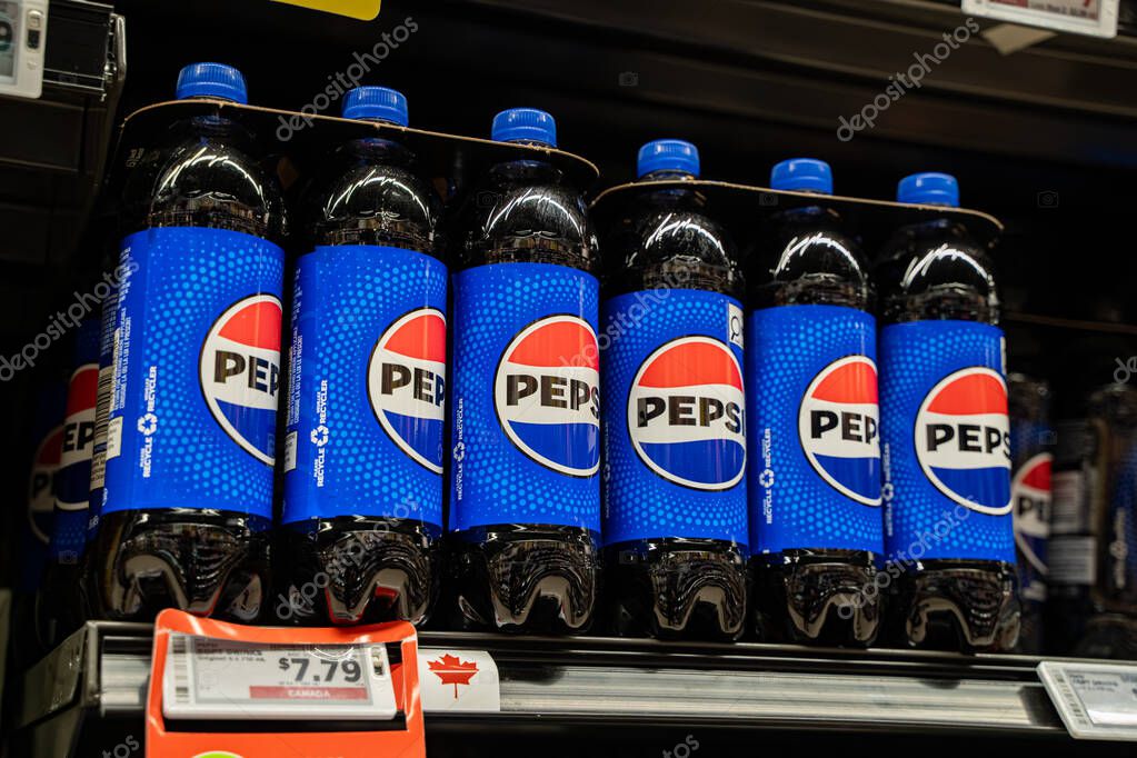 Close up of Pepsi bottles on supermarket shelf. Toronto, Canada - September 20, 2025.
