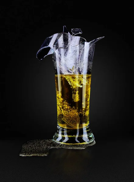 Lemonade poured into a broken clear glass