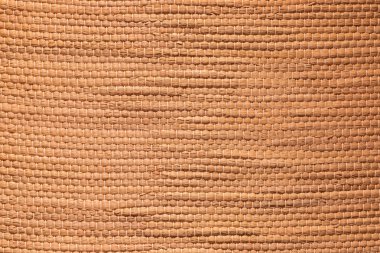 Tan dokulu bambu kumaş arka plan knot dolu gösteriyordu.