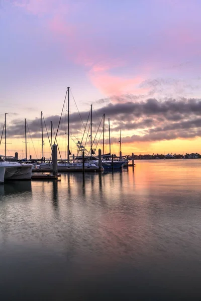 Break of dawn sunrise over boats and sailboats at Factory Bay ma — Stock Photo, Image