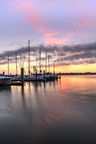 Break of dawn sunrise over boats and sailboats at Factory Bay ma — Stock Photo, Image