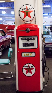 Antique Red Texaco Gasoline pump displayed at the Muscle Car Cit clipart