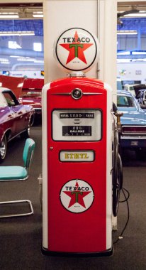 Antique Red Texaco Gasoline pump displayed at the Muscle Car Cit clipart