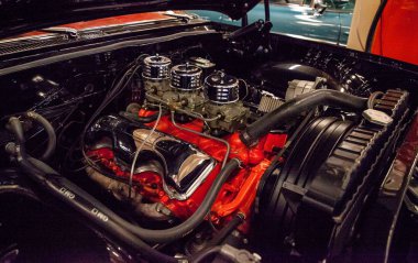 Siyah 1961 Chevrolet Bel Air Muscle Car City 'de sergileniyor.